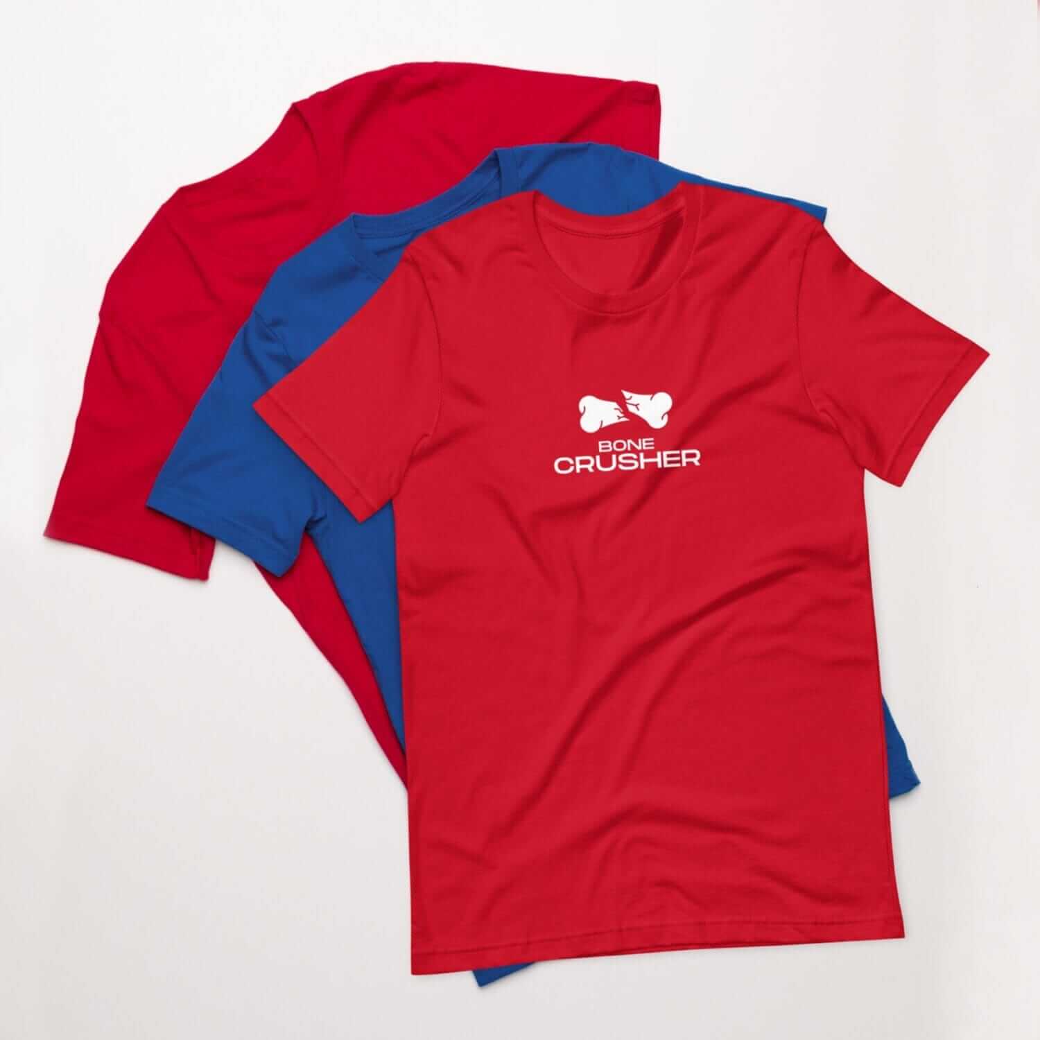 Three red, blue and white t - shirts.