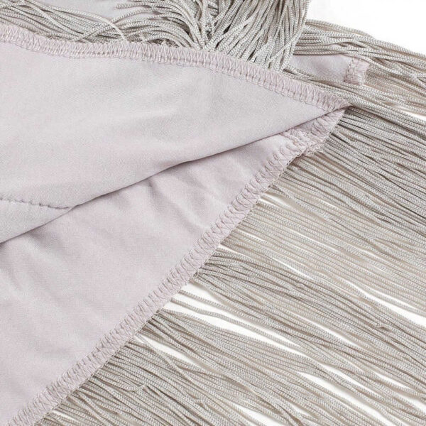 A close up of a blanket with fringes on it, resembling a Flapper Mini Dress with Headband.