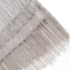 A silver fringed scarf on a white background adorned with a Flapper Mini Dress with Headband.