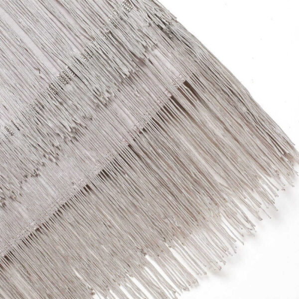 A silver fringed scarf on a white background adorned with a Flapper Mini Dress with Headband.