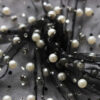A close up of a Pearl Embellished Crop Top.