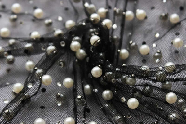 A close up of a Pearl Embellished Crop Top.