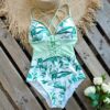 A Vintage Retro bathing suit paired with a straw hat.