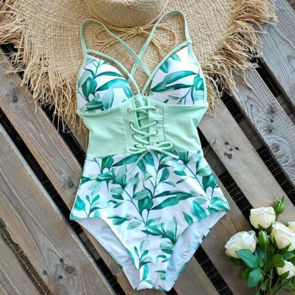 A Vintage Retro bathing suit paired with a straw hat.