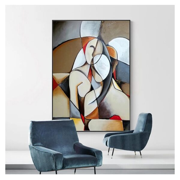 Modern abstract painting titled "UNITED IN LOVE" hanging on a white wall above two blue velvet chairs in a minimalist interior setting.