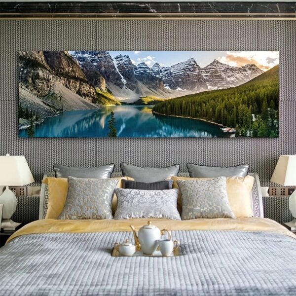 A bedroom features a large Landscape Wall Art piece depicting a mountain landscape above the bed. The bed is made with grey and yellow bedding, flanked by matching bedside tables and lamps.