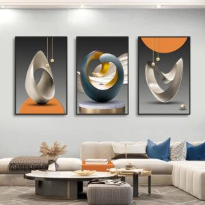 A minimalist living room features three 3pcs Modern Geometric on the wall above a grey L-shaped sofa and round coffee table with decor items.