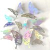 A set of 12Pcs Fashion 3D Hollow Butterfly holographic paper cutouts, featuring iridescent shades and displayed on a white background.