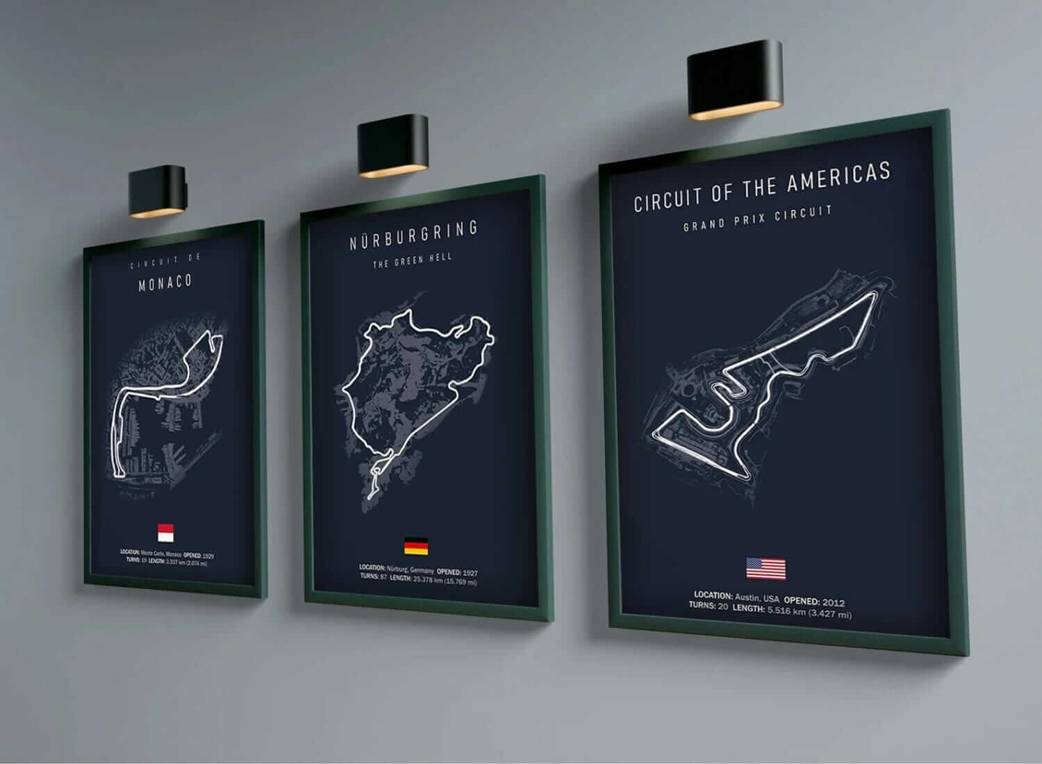 Three framed FORMULA F1 TRACK CIRCUIT posters featuring iconic track maps of Circuit de Monaco, Nürburgring, and Circuit of the Americas, elegantly displayed on a wall under spotlights.